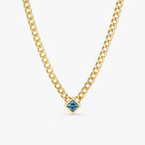 solid 14k yellow gold miami chain with blue topaz