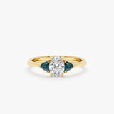 white diamond ring with trillion cut teal sapphires in solid gold