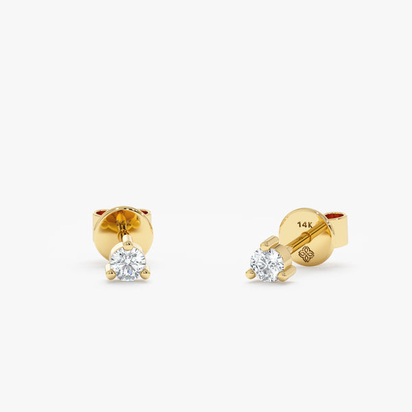 handmade pair of solid 14k gold natural diamond 3 prong studs