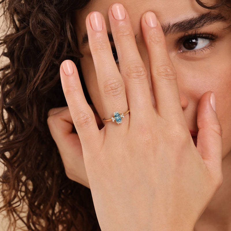 14k blue zircon ring with white diamonds in solid gold