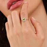 round peridot ring with natural white diamond halo in 18k solid gold 