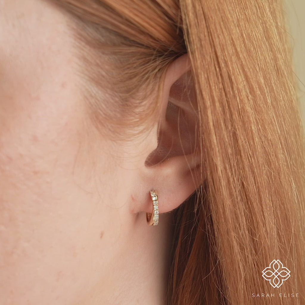 video close up of x shape diamond shape hoop earring handmade in solid 14k gold gift for her