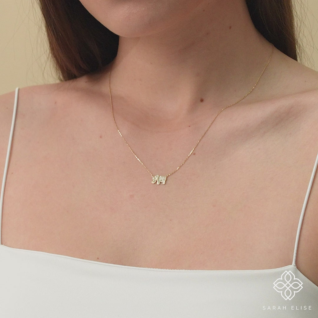 Luxurious diamond elephant pendant on a 14k gold chain