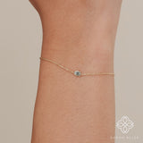 dainty hamsa hand and single diamond bracelet for her