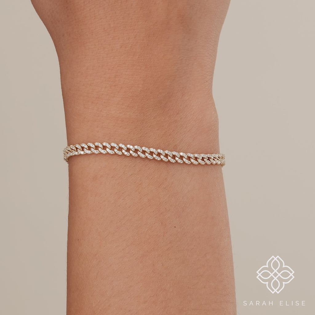 Add a touch of glamour with this diamond Cuban link bracelet in solid gold.