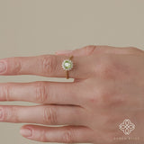 peridot engagement ring with natural diamond halo
