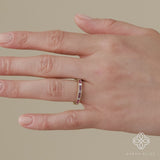 alternating baguette-cut and round pink sapphire ring