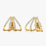 handmade pair of solid 14k gold arrow shape stud earrings with four lined diamonds