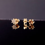 Minimalistic Star of David Studs in solid gold with paved diamonds