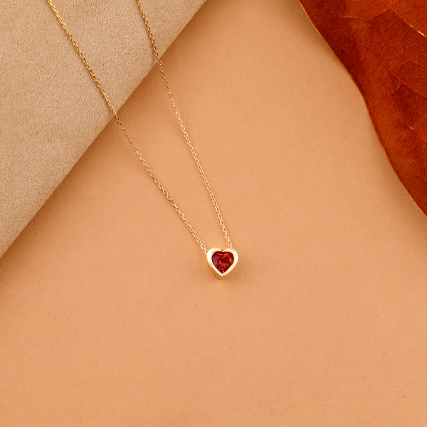 Petite Garnet Heart Pendant In Solid Gold