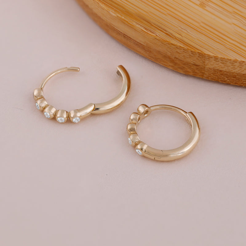 5 bezel Diamond Mini Gold Hoop earrings in solid gold