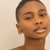 Model wears Diamond Leaf Stud earrings with diamonds gift for her