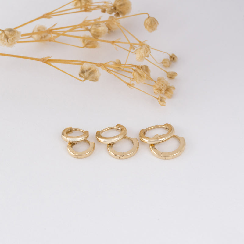 Different Sizes Solid Gold hoop Huggies for her