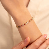 Solid Gold Garnet Tennis Bracelet with Diamonds