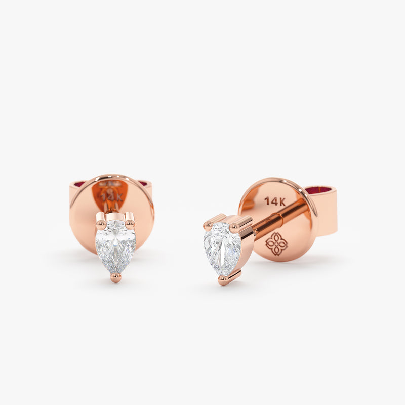 handmade 14k rose gold stud earrings with pear cut diamond 