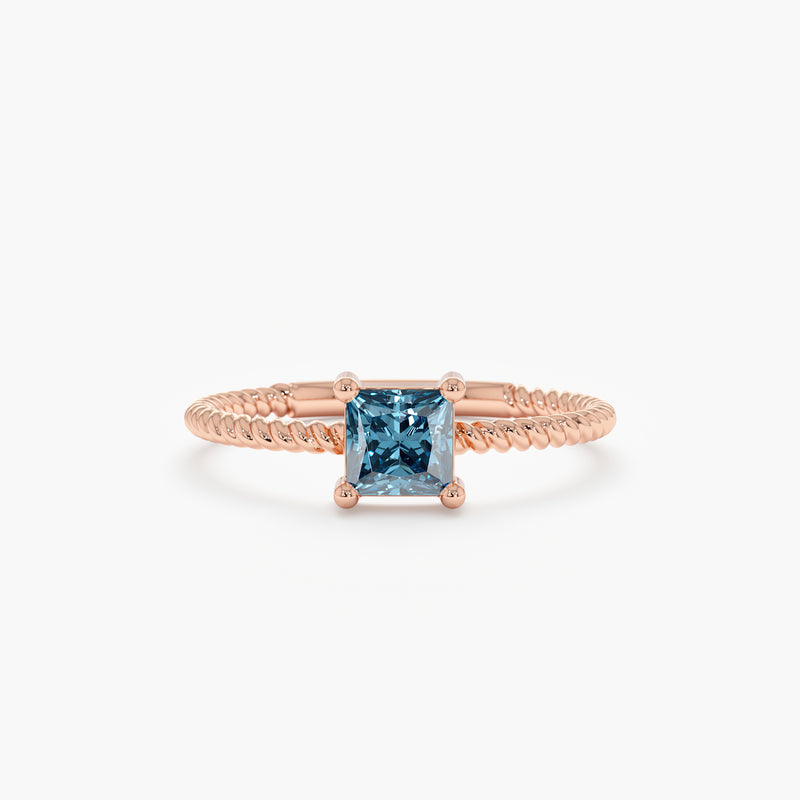 Rose Gold Prong Set Blue Topaz Ring