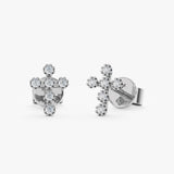 handcrafted pair of solid 14k white gold multiple diamond prong cross stud earrings