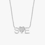 white gold necklace featuring two custom initials framing a heart filled with sparkling diamonds.